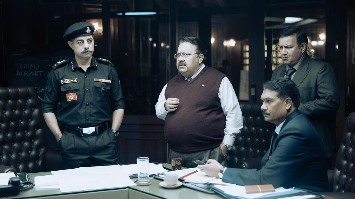 Manoj Pahwa as Mukul Mohan, Aditya Srivastava as VK Aggarwal, Kumud Mishra as Ranjan Mishra in 'IC 814: The Kandahar Hijack'.