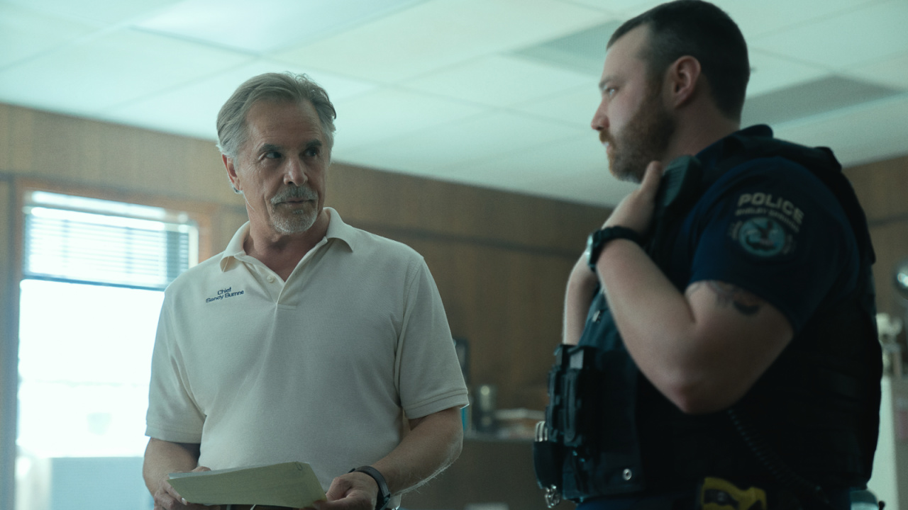 (L to R) Don Johnson as Chief Sandy Burns and Emory Cohen as Officer Steve Lan in 'Rebel Ridge'. Photo: Alison Riggs/Netflix © 2024.