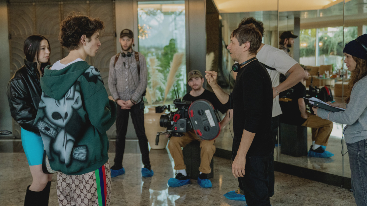 (L to R) Sean Baker, Mikey Madison and Mark Eidelstein on the set of 'Anora'. Photo: Courtesy of NEON.